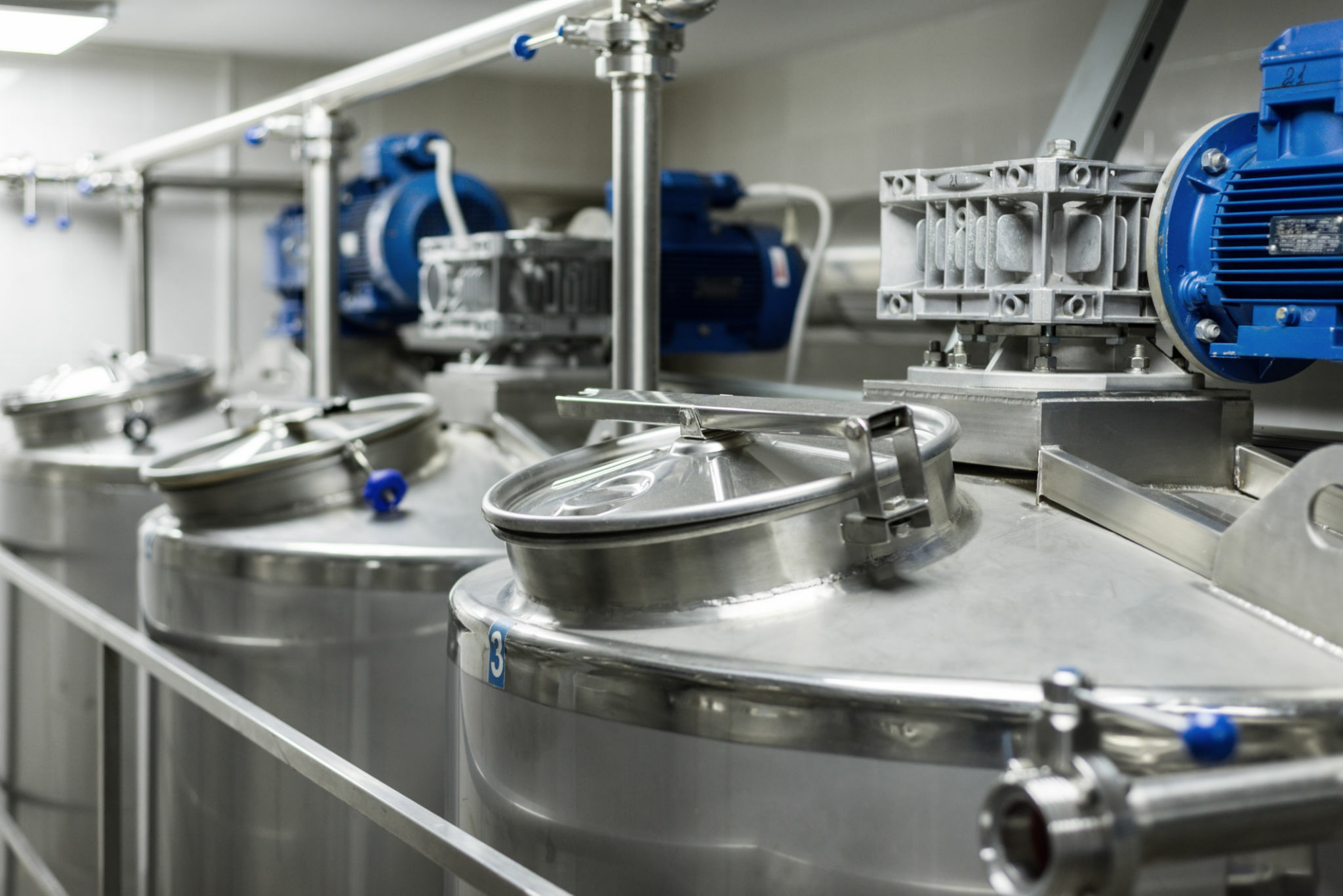 A number of electric motors with reducers. Tanks for mixing liquids. Food industry.